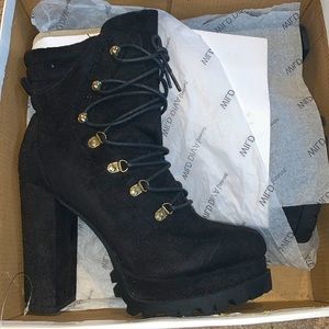 Black heel tie up boots